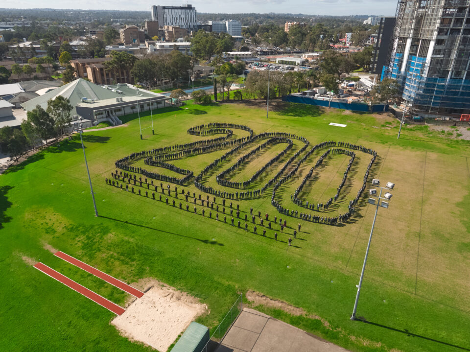 School team formation photo by drone, forming the number 200 to celebrate their 200th aniversary. Photo taken by Sky Monkey